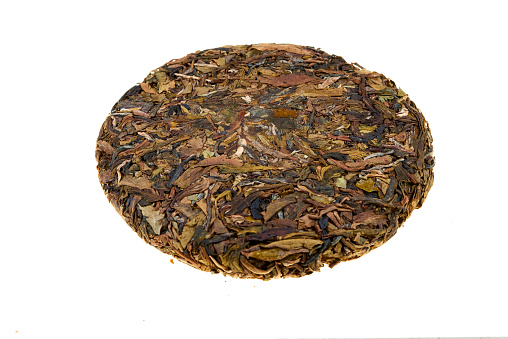 Chinese Pu-erh tea on white background.
