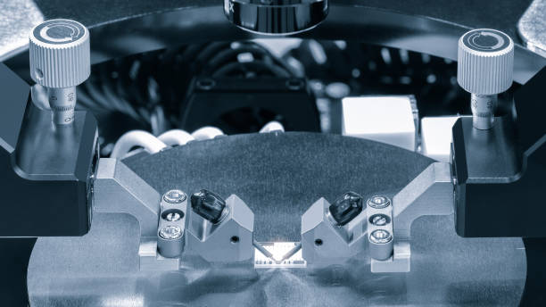 istock Close up of examining of test sample of microchip transistor under the microscope in laboratory. Equipment for testing microchips. Automation of production. Manufacturing of microchips. 1487322903