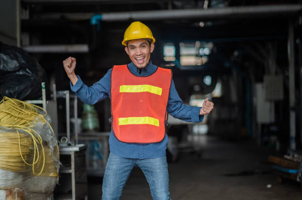istock portrait of Asian man engineer construction concept, Asian man engineer in construction site, Worker in building construction site, worker helmet confident copy spec, worker in safety suit at work 1487323708