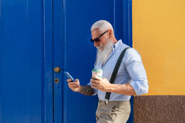 istock Senior man with a phone 1487323771