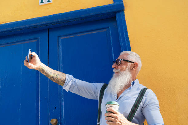 istock Senior man with a phone 1487323779