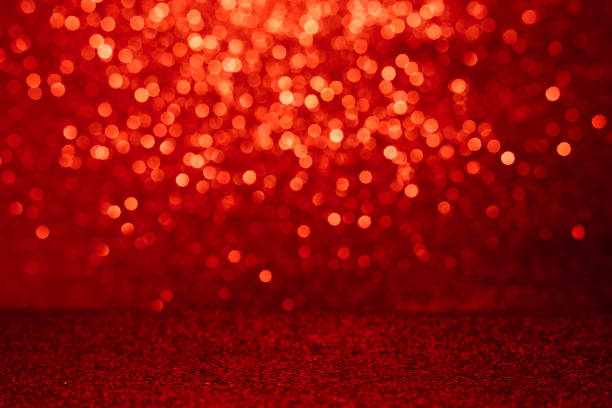 メリークリスマスの背景に赤いボケのライト
