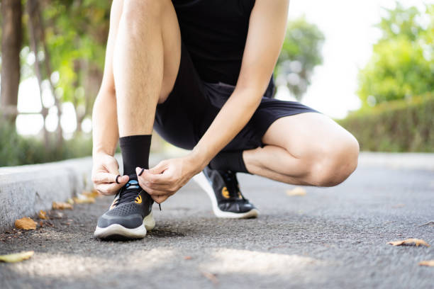 istock Asian man making an outdoor exercise. 1487325837