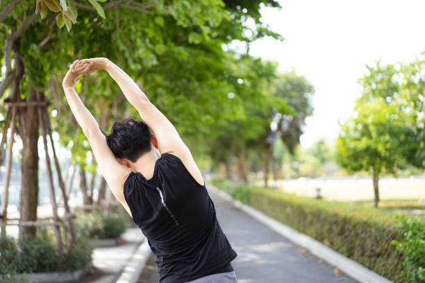 istock Asian man making an outdoor exercise. 1487325846