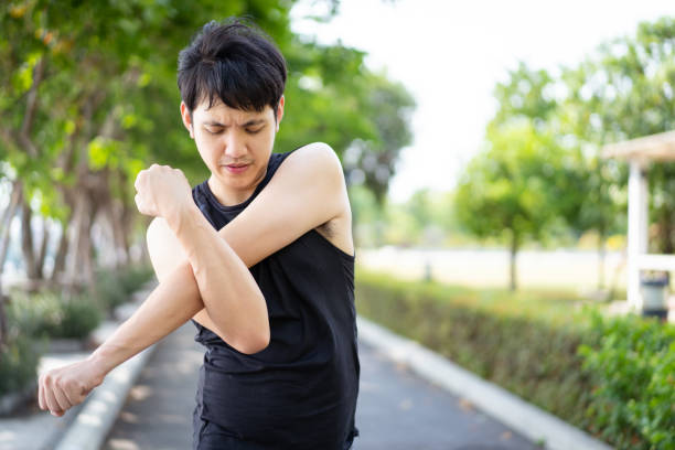 istock Asian man making an outdoor exercise. 1487325847