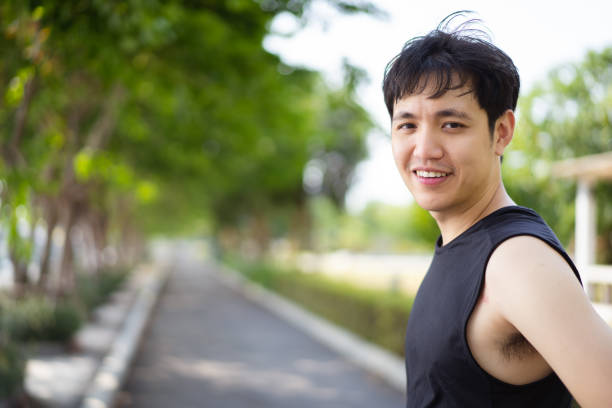 istock Asian man making an outdoor exercise. 1487326003