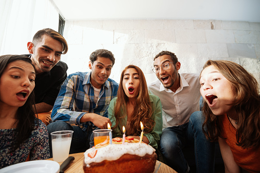 The collage of faces of surprised people on colored backgrounds. Happy men and women smiling. Human emotions, facial expression concept. collage of different human facial expressions, emotions, feelings