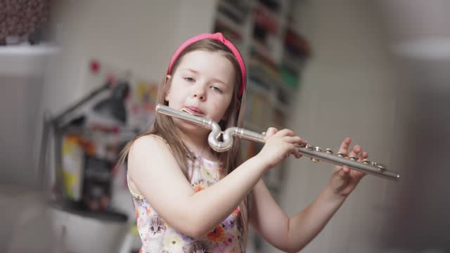 School Girl Plays Flute