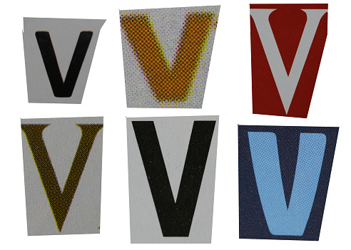 Letter v magazine cut out font, ransom letter, isolated collage elements for text alphabet, ransom note, hand made and cut from Old newspaper magazine cutouts, high quality scan.