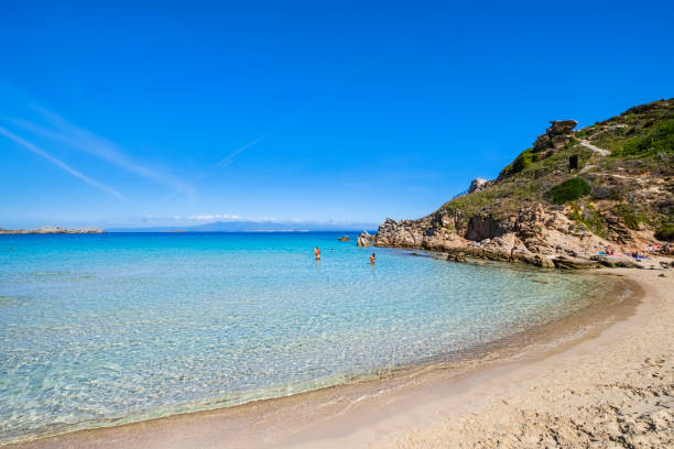 Turquoise water lapping the shore of Santa Teresa Gallura - Sardinia stock photo