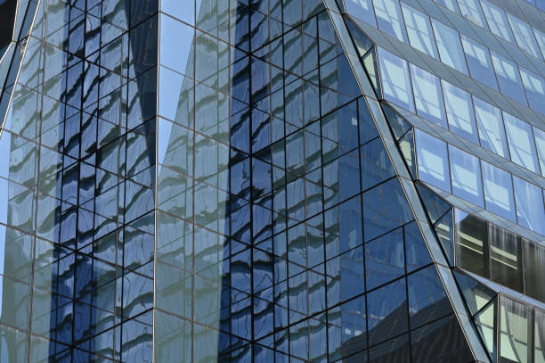 istock Modern Business Office Buildings Reflecting 1487331109