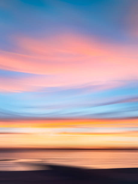 istock Sky and sea at sunrise or sunset with motion and blur 1487333754