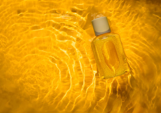 One single new clean blank generic yellow shampoo bottle, object isolated on white, cut out, front view, empty mockup template, no label, no logo. Bathroom supplies, beauty, hygiene product container