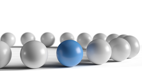 Being Unique, Leadership, Winning Strategy in Business Concept: Blue ball standing out from the crowd of white shiny spheres. White presentation background, copy space. Difference, diversity, individuality, outstanding 3D illustration design template.