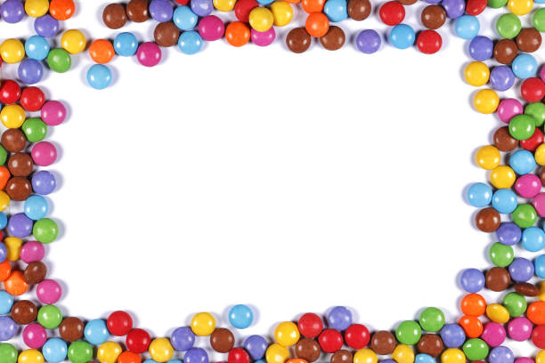 istock Multi coloured halloween candy sweet border on white 1487339774