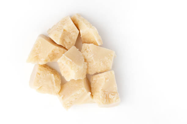 istock pieces of parmesan cheese isolated on white 1487341818