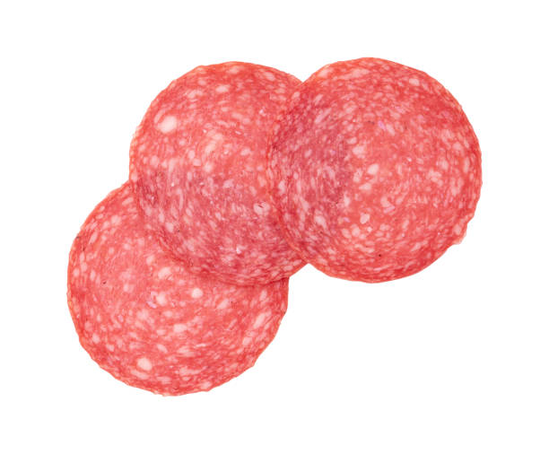 istock salami sausage cut into pieces isolated on white 1487341827