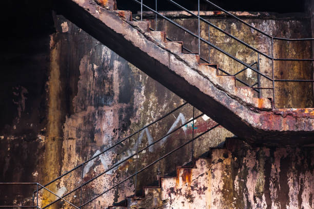 istock Part of a dry dock wall with a concrete staircase. 1487342984