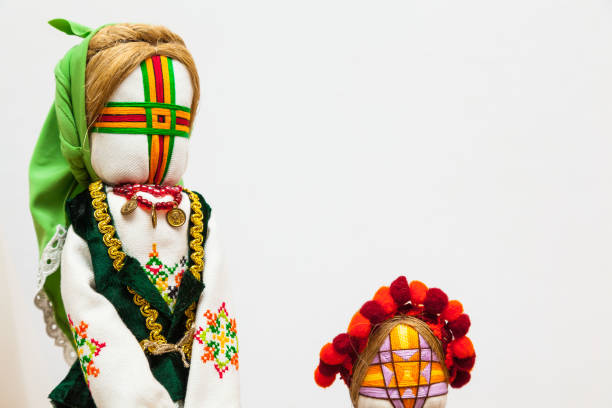 istock Handmade soft toys dressed in traditional rustic outfits on a white background. 1487343059