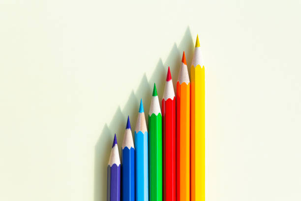 Numerous, bright pencils for drawing in an album in drawing classes.