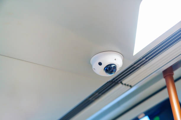 istock Surveillance camera with microphone on the ceiling in a subway car 1487346901