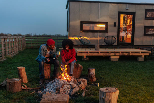 istock African American couple at campfire. 1487351020