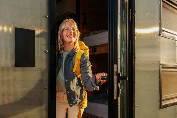 istock Joyful woman at weekend cabin. 1487352433
