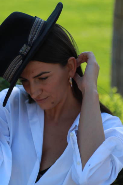 istock Young woman with hat 1487353608