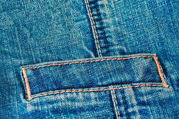 istock Blue jeans fabric, denim pocket, texture textile, abstract background 1487356619