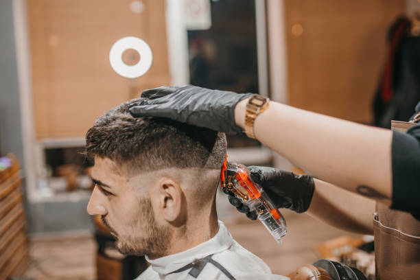 istock Young male client at barber shop 1487356629