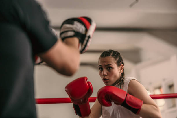 istock sparring and fighting on the boxing ring 1487361240