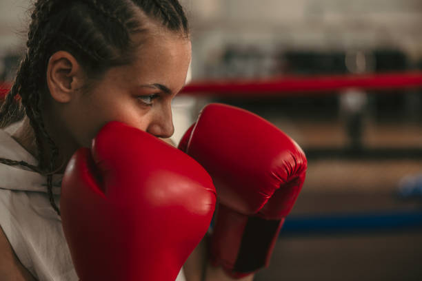istock sparring and fighting on the boxing ring 1487361562