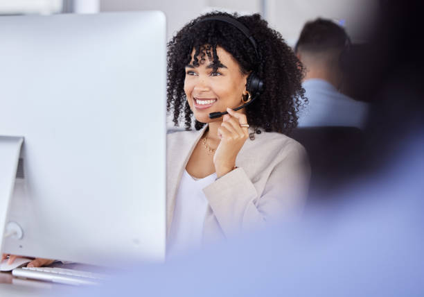 istock Callcenter, customer service or black woman on computer for support, consulting or networking in office. Manager, CRM or sales advisor on tech for telemarketing, research or contact us help at desk 1487368805