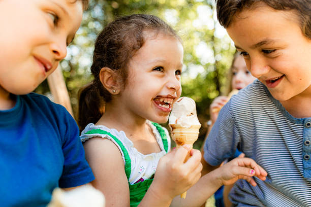 istock Children eating ice cream in the summer 1487370466