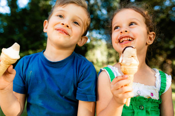 istock Children eating ice cream in the summer 1487370565