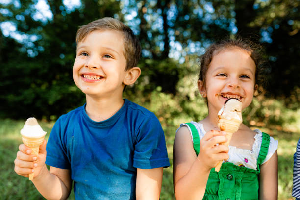 istock Children eating ice cream in the summer 1487370629