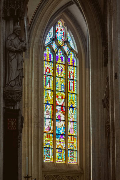 istock Saint statue and Stained Glass 1487371668