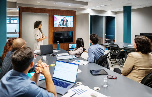 istock Business team and CEO communicating in video conference 1487373199