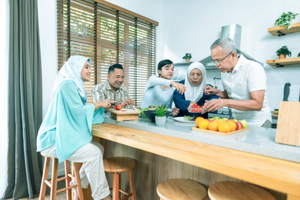 istock Multi generation family making salad at home 1487373206