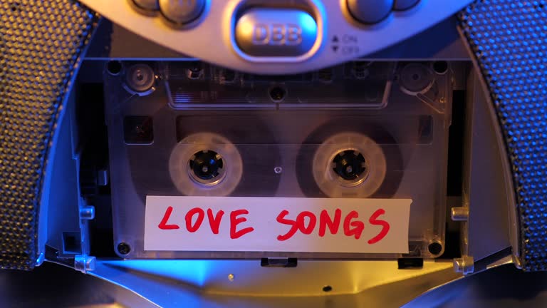 writing with a marker on old vintage tape audio cassette Love Songs