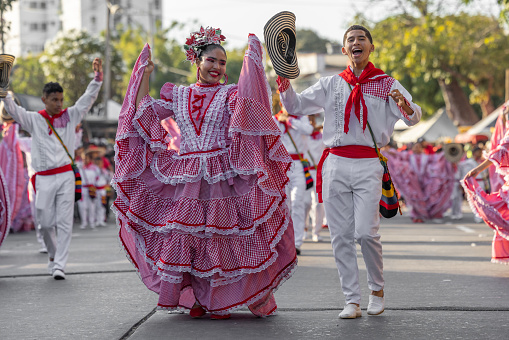 Performers with colorful and elaborate costumes participate in Barranquillas Carnaval. Barranquilla Colombia 3 May 2023