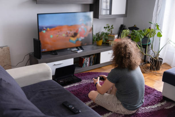 istock Afternoon video game playing in the living room 1487379514