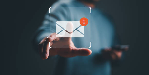 istock New email notification concept for business e-mail communication and digital marketing. Inbox receiving electronic message alert. business people touch on email in virtual screen. internet technology. 1487381945