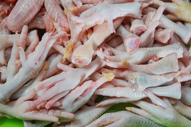 istock pile of fresh raw chicken legs 1487385216