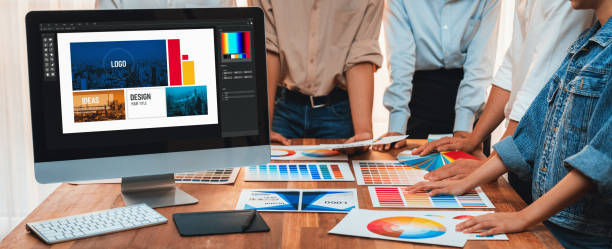 istock Graphic designer brainstorming logo and graphic arts at workshop. Scrutinize 1487386496