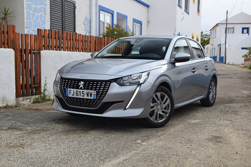 Grandola, Portugal - 17th October, 2019: Peugeot 208 in basic version stopped on a street. This model is one of the most popular cars in Europe.