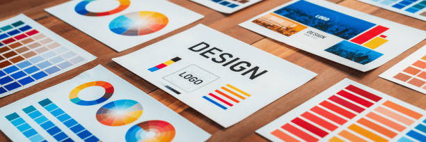 istock Various color palette idea papers arranged on workspace for designer. Scrutinize 1487387161