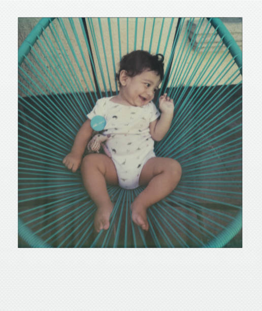 istock toddler sitting in chair 1487388112