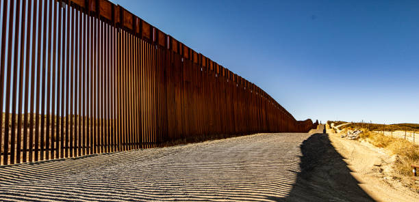 US Border Wall Campo, CA, USA - November 13, 2021: Views of the US border wall located near San Diego, California. torrey pines tree stock pictures, royalty-free photos & images