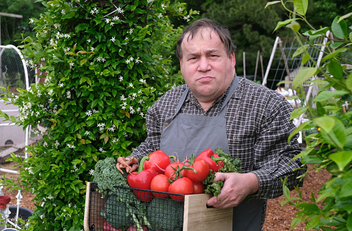Autistic man in a vegetable garden